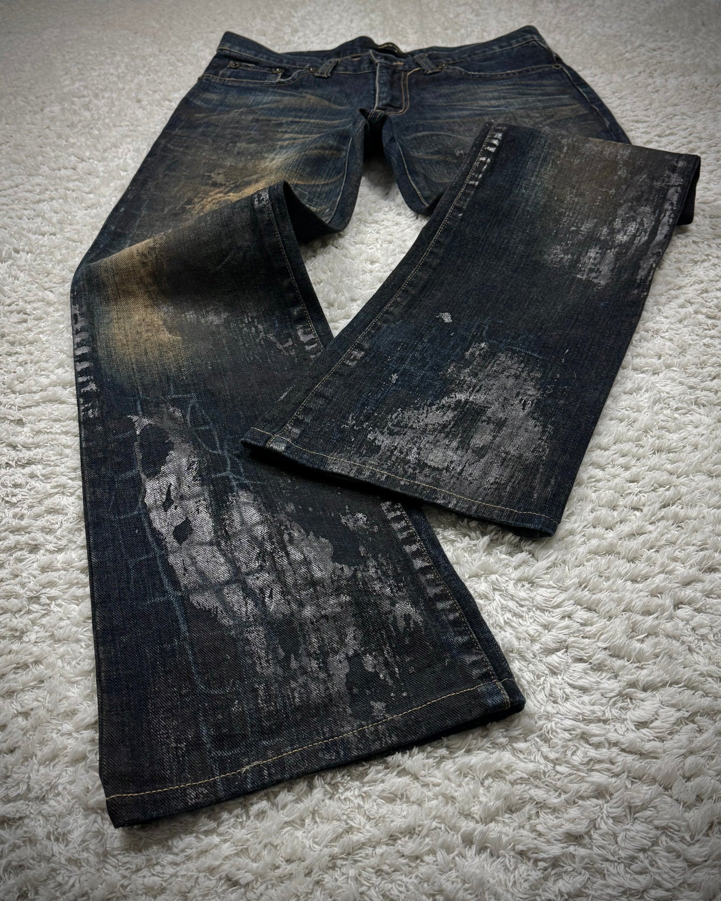 Semantic Design Mud Washed Python Waxed Bootcut Jeans