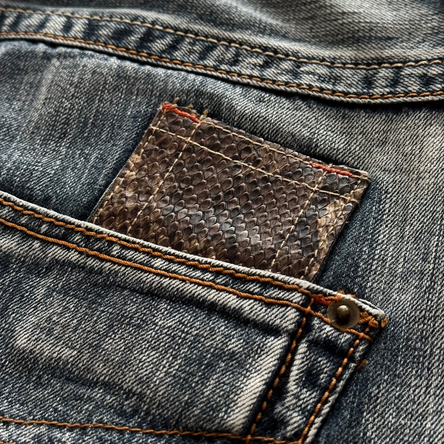 Semantic Design Zippered Python Detailed Flared Jeans