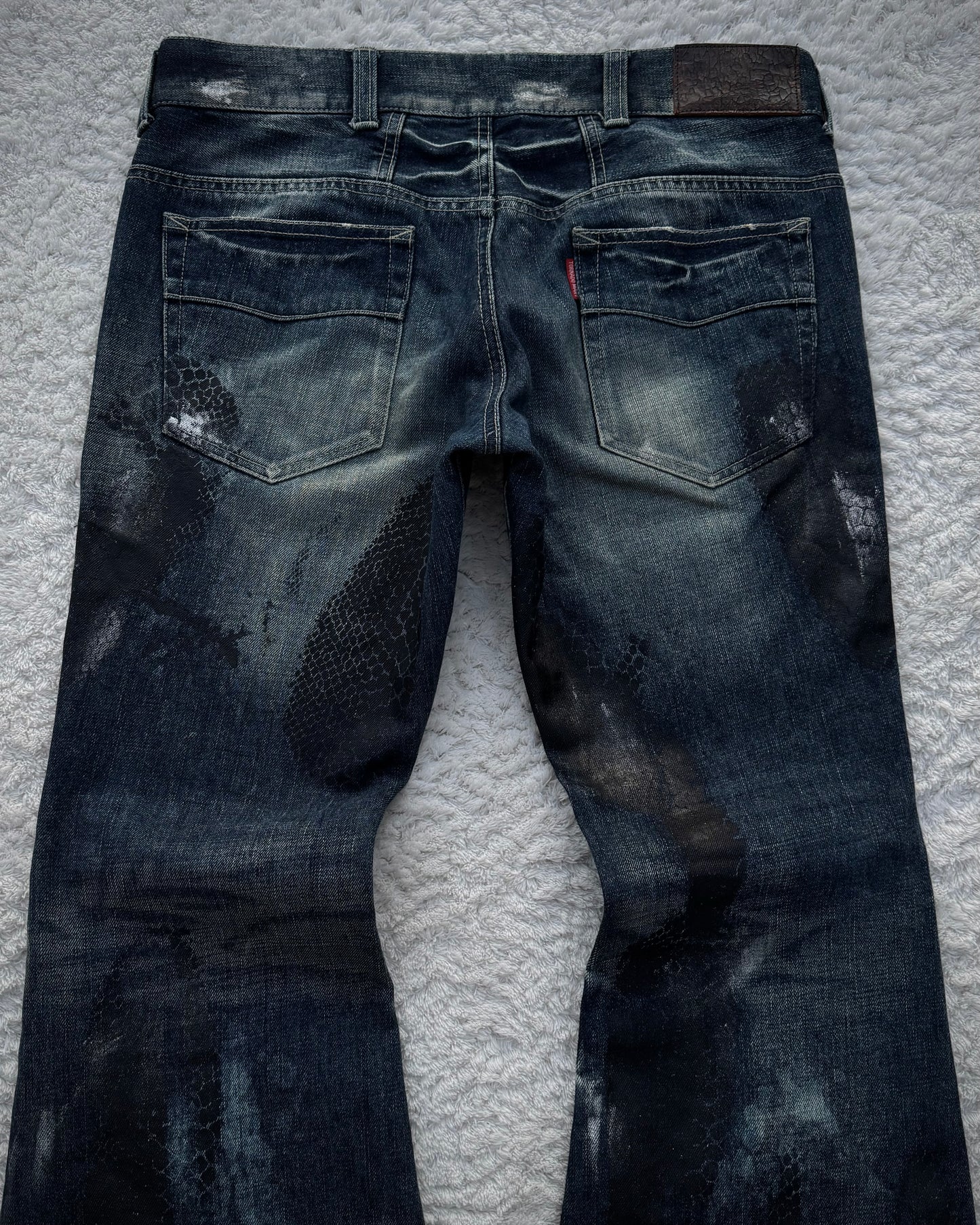 Tornado Mart Snakeskin Imprinted Flared Jeans