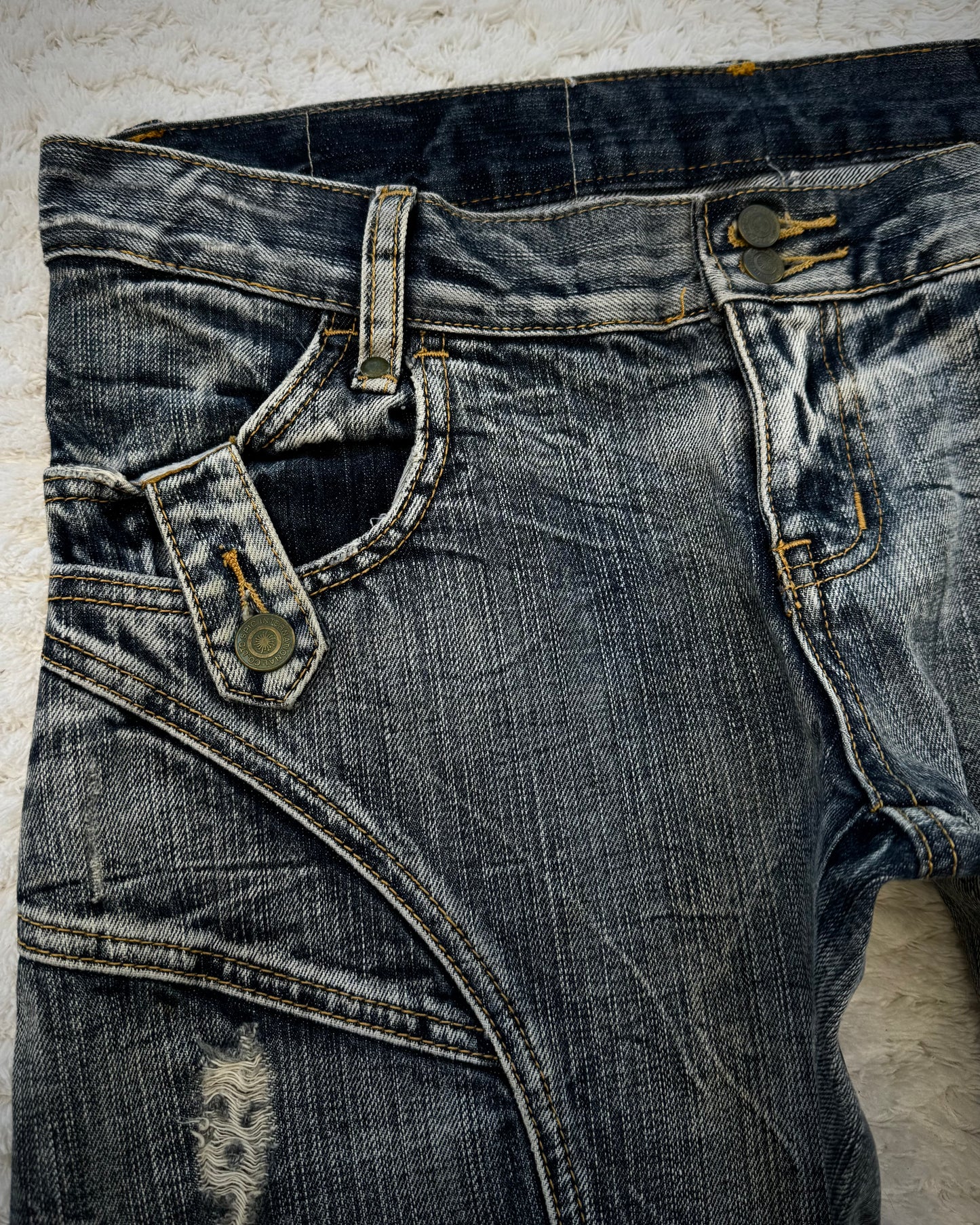 Tornado Mart Multi-Panel Crinkle Washed Flared Jeans