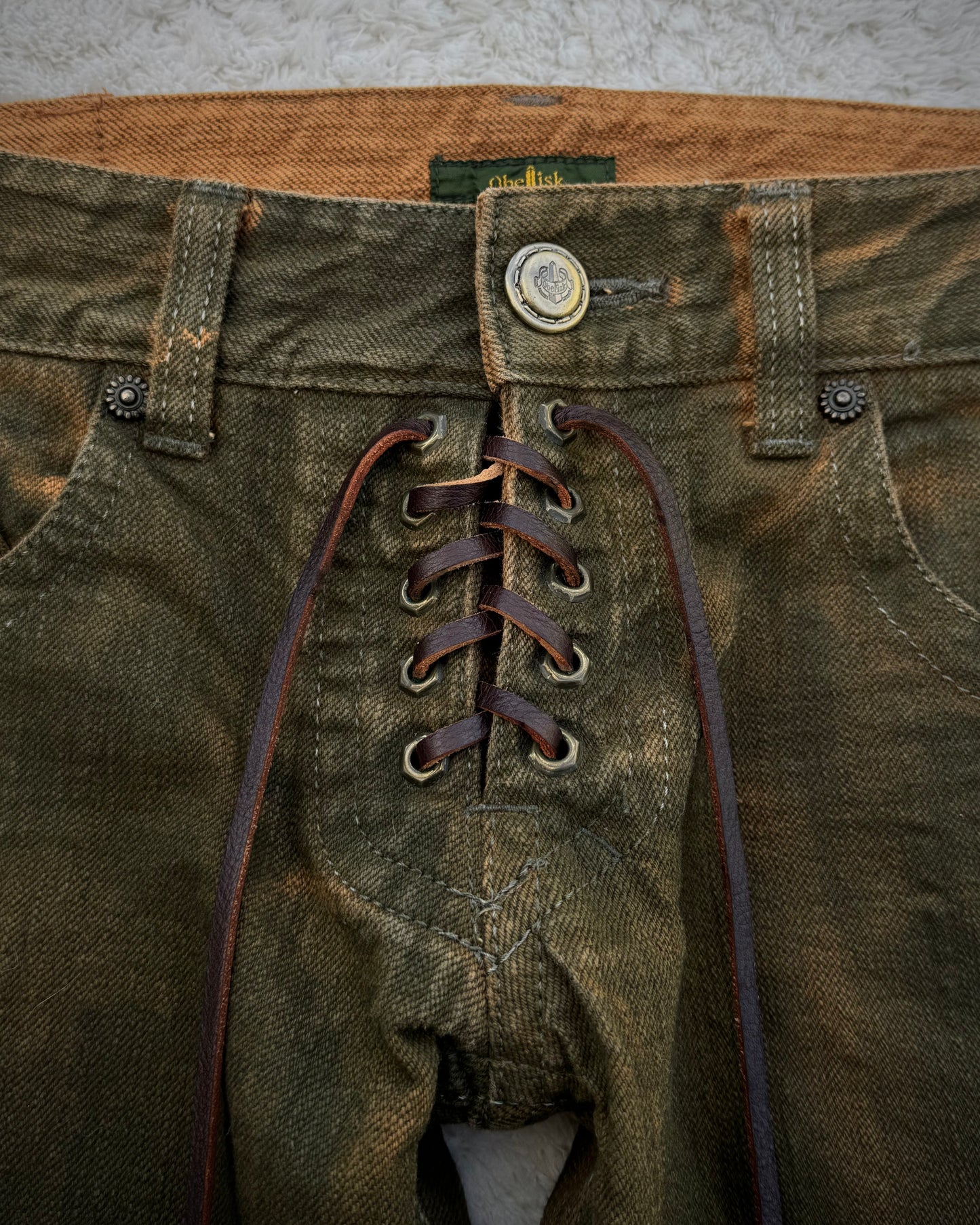 Obelisk Fringed Mud Washed Lace Up Flared Jeans