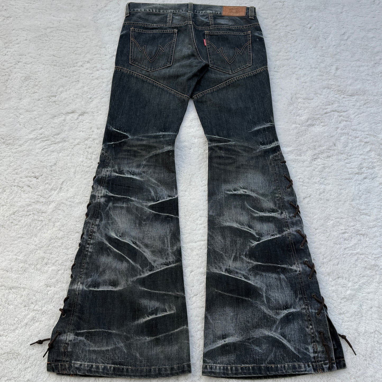 Tornado Mart Flared Lace-Up Jeans