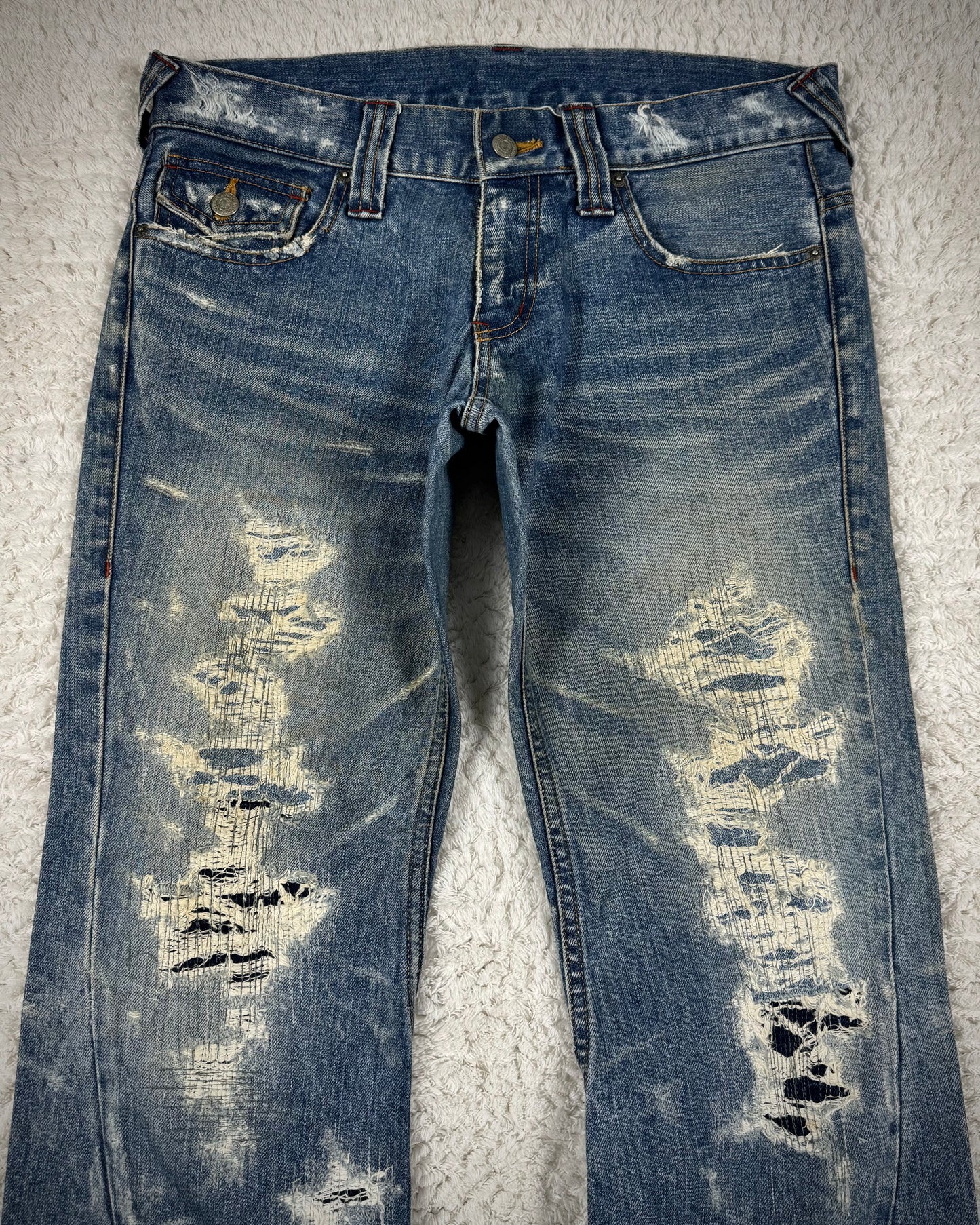 Tornado Mart Repaired Distressing Spiral Flared Jeans