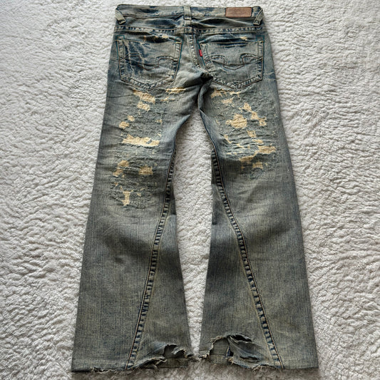 Tornado Mart Repaired Distressing Flared Jeans