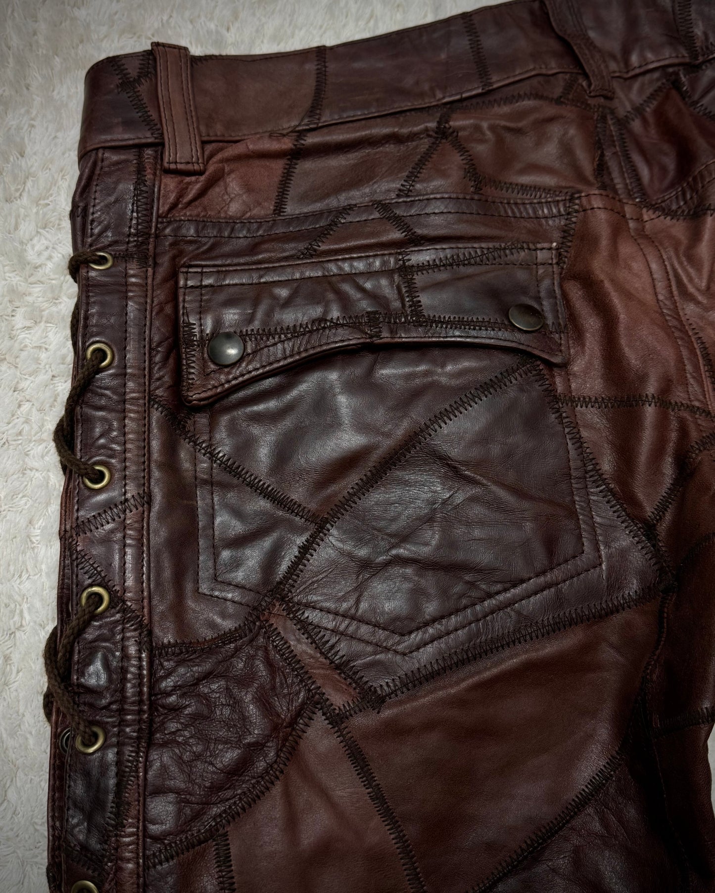 Tornado Mart Oxblood Scar Stitched Leather Patchwork Lace Up Flared Pants