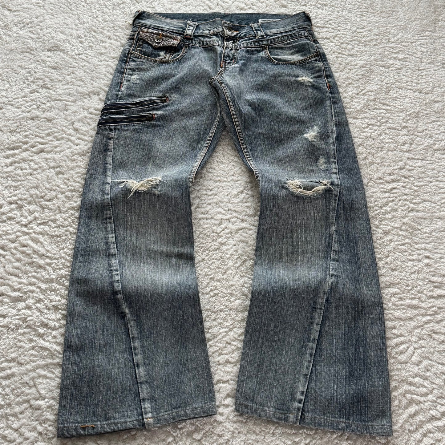 Semantic Design Zippered Python Detailed Flared Jeans