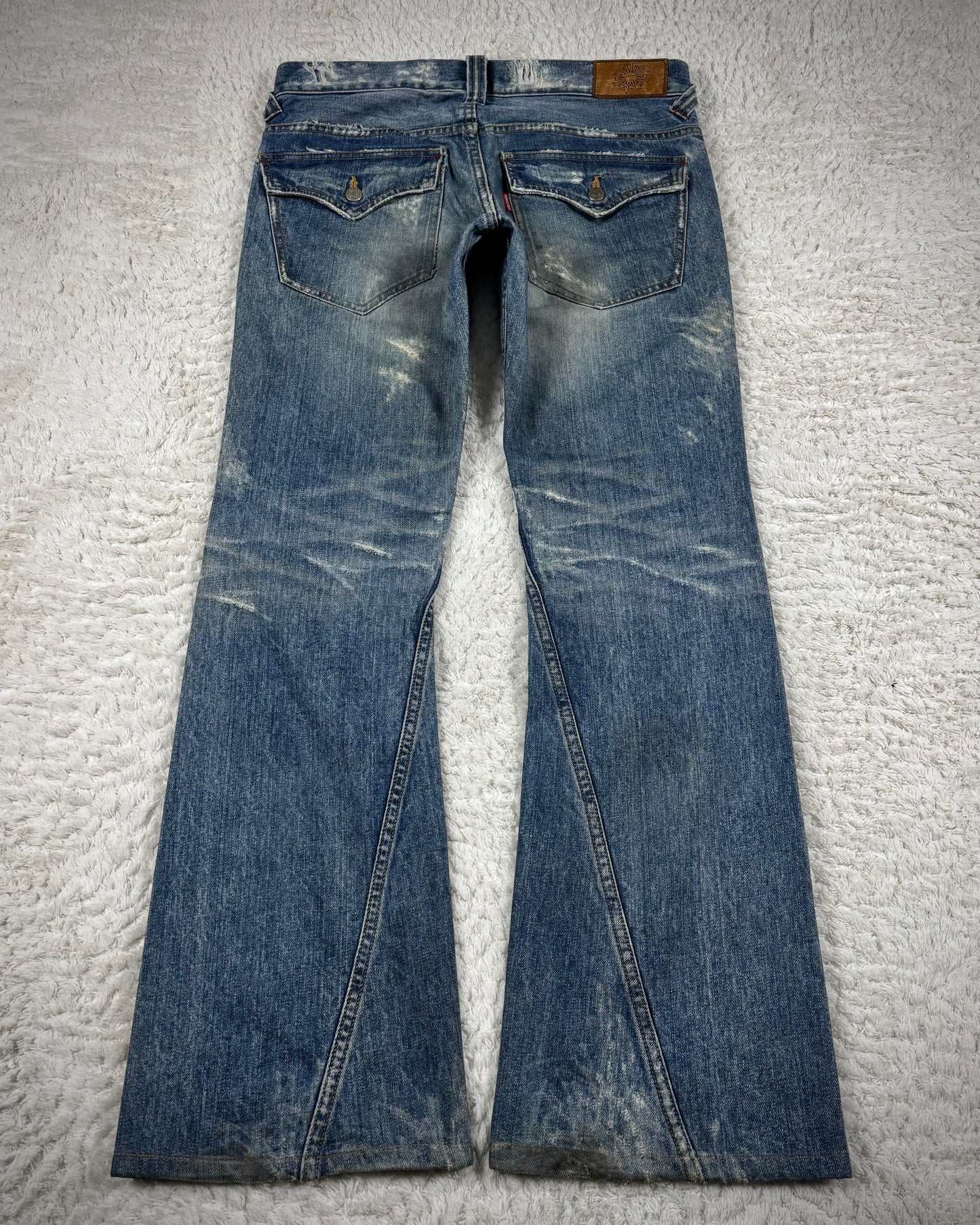 Tornado Mart Repaired Distressing Spiral Flared Jeans