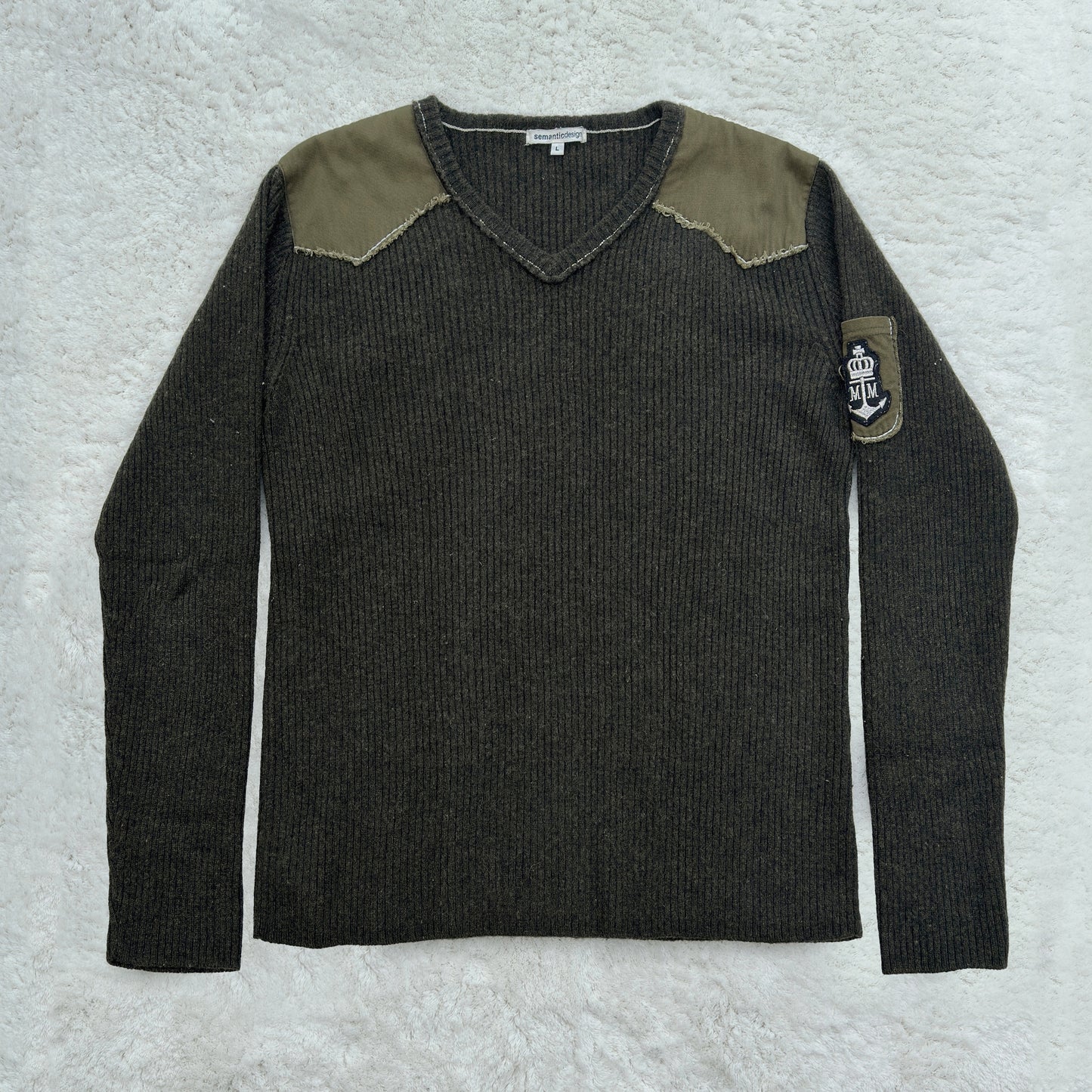 Semantic Design Shoulder Padded Ribbed Knit Sweater