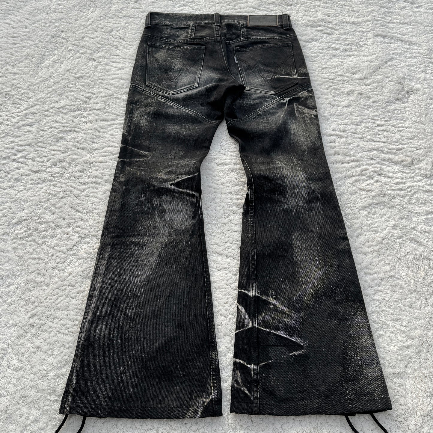 Tornado Mart Snakeskin Imprint Lace-Up Flared Jeans