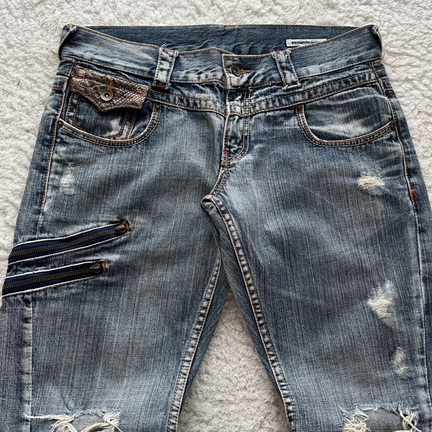 Semantic Design Zippered Python Detailed Flared Jeans