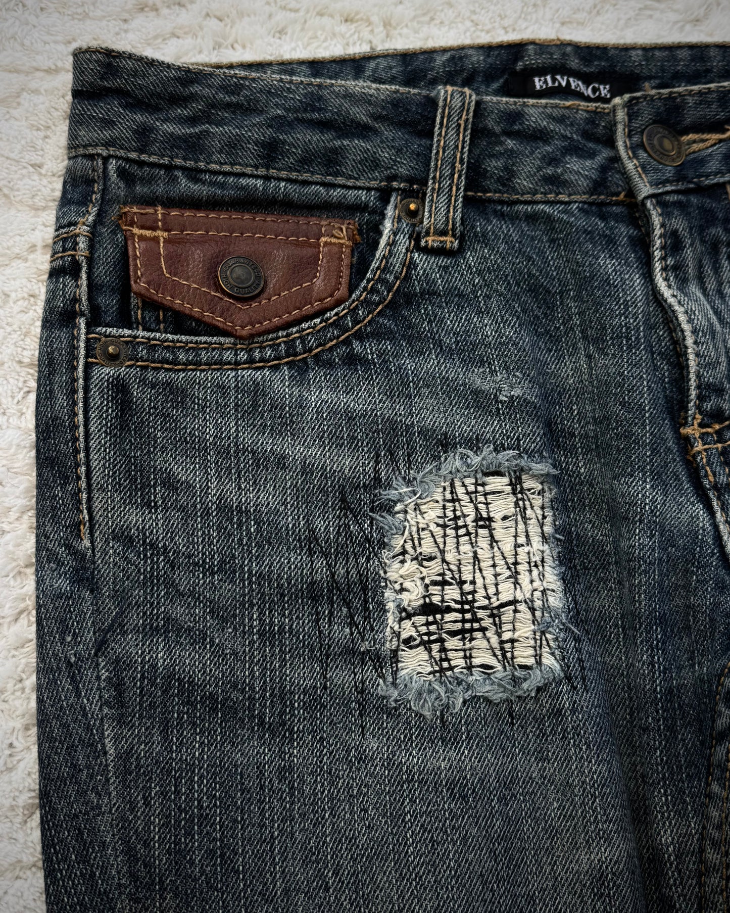 Elvence Repaired Western Spiral Flared Jeans