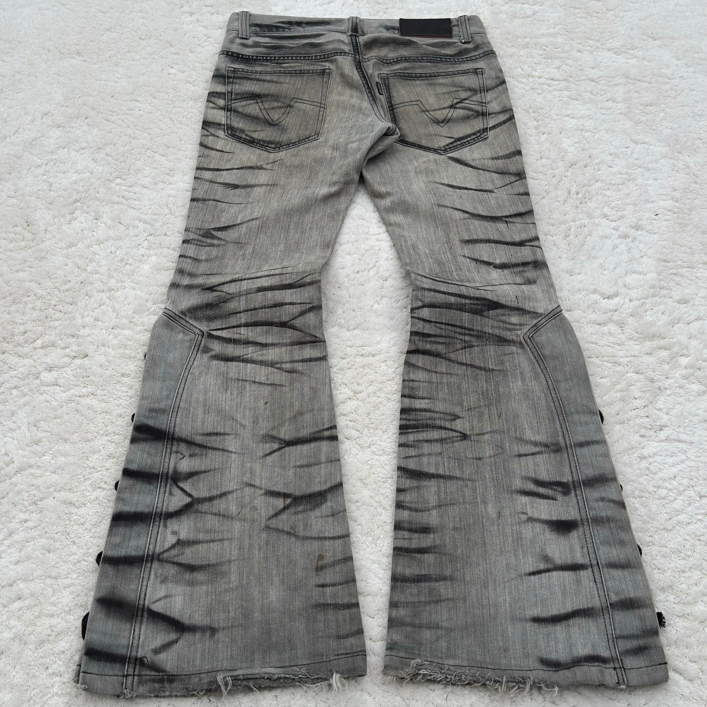 Tornado Mart Zebra Claw Marks Flared Lace-Up Jeans
