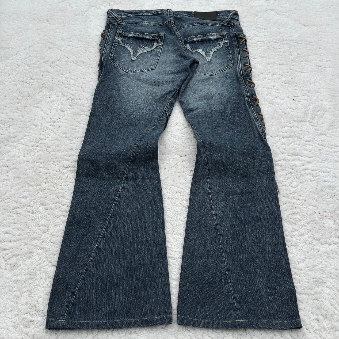 Tornado Mart Thigh Lace-Up Spiral Cut Flared Jeans