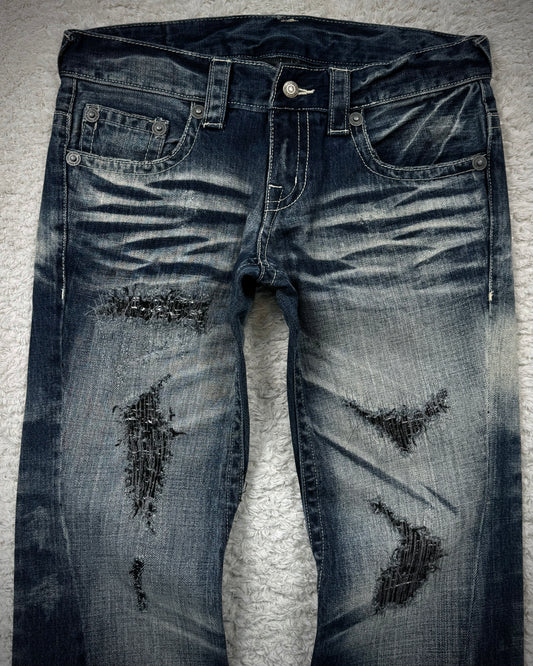 Tornado Mart Stitch Repaired Clawmarks Washed Spiral Flared Jeans