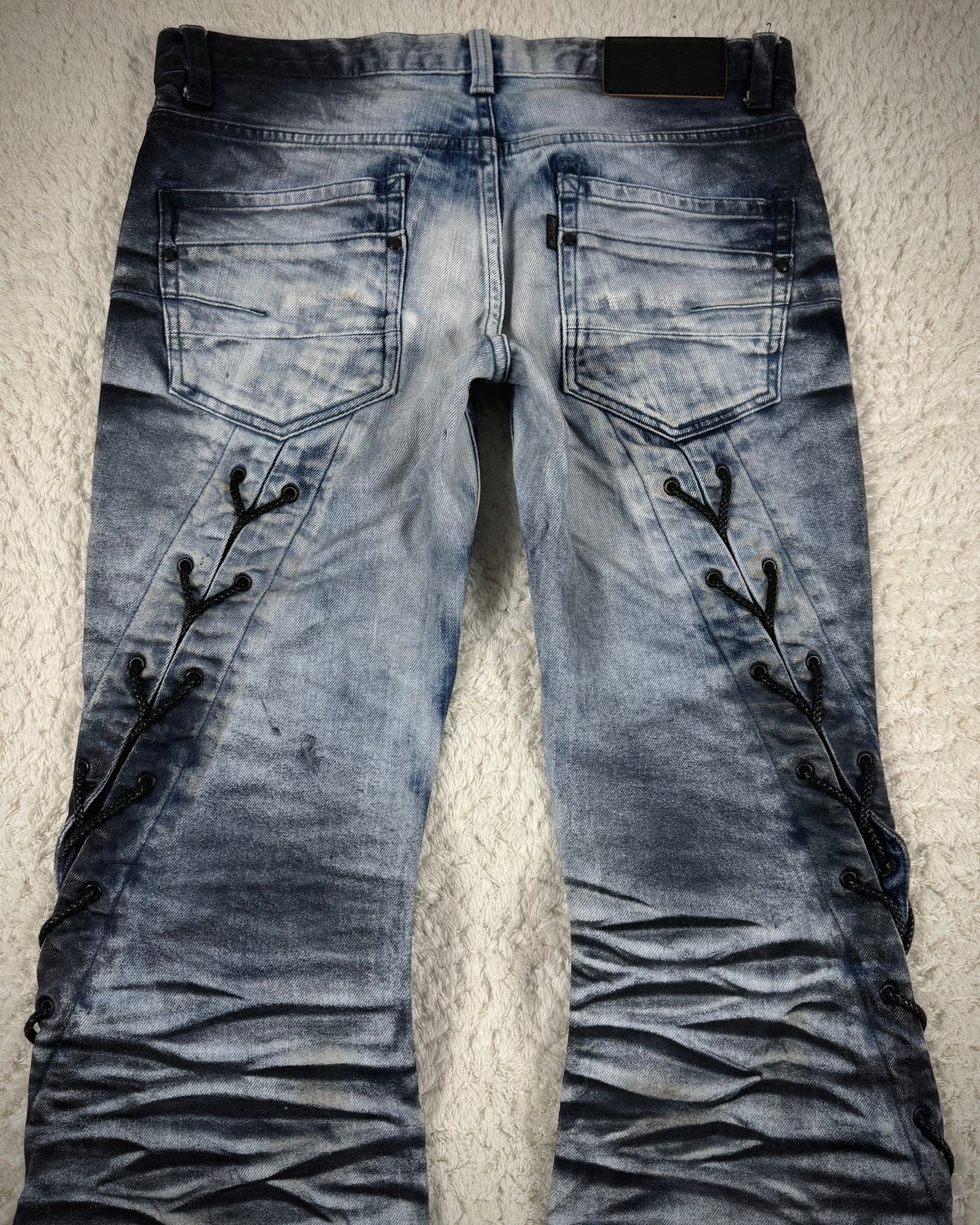 Tornado Mart Clawmark Washed Spiral Lace Up Flared Jeans