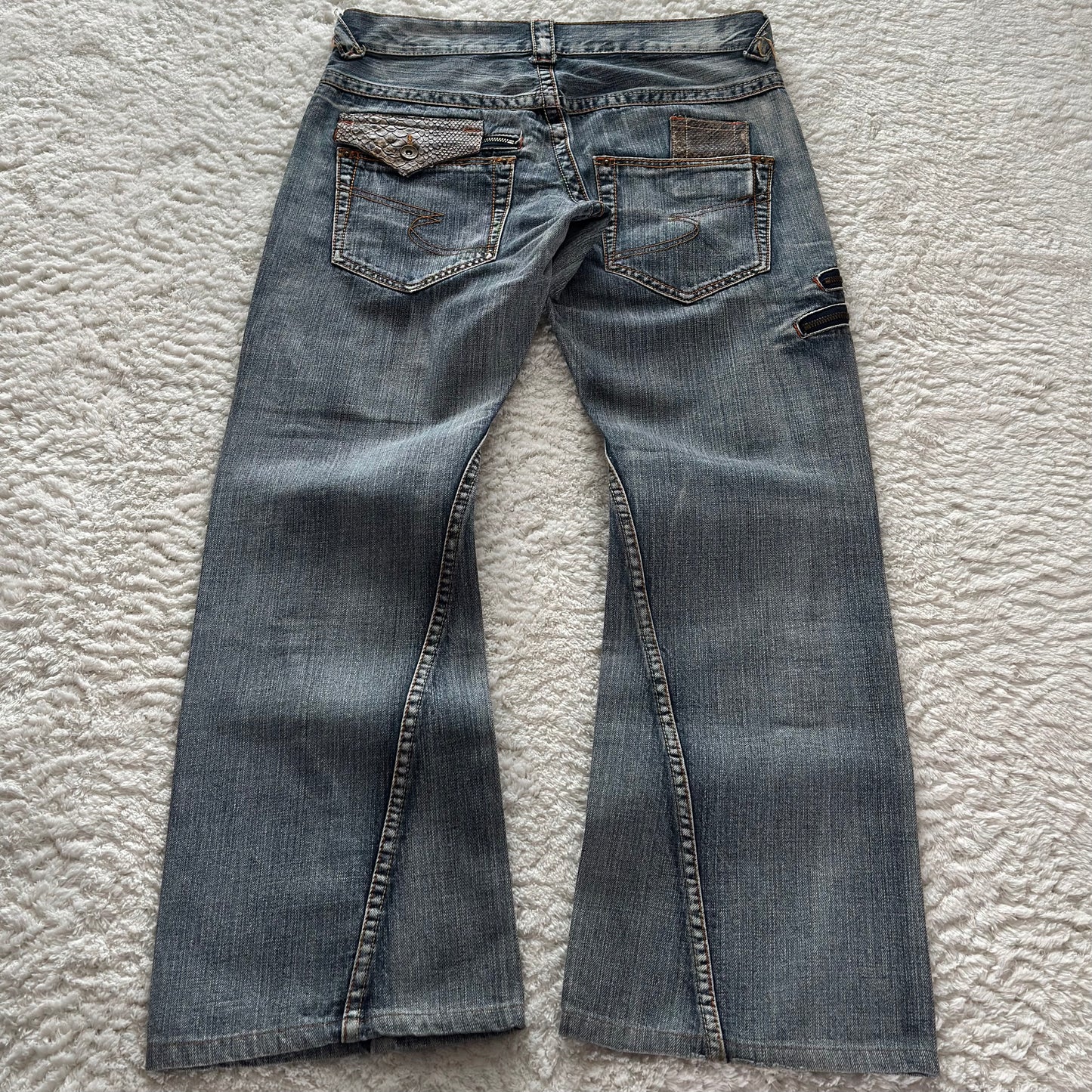 Semantic Design Zippered Python Detailed Flared Jeans