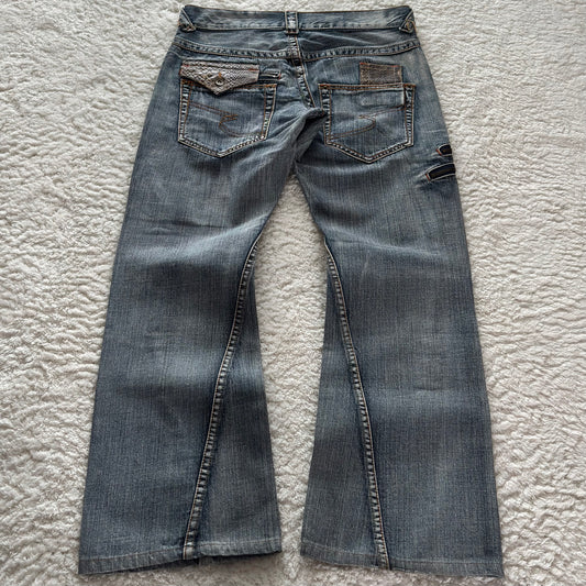 Semantic Design Zippered Python Detailed Flared Jeans