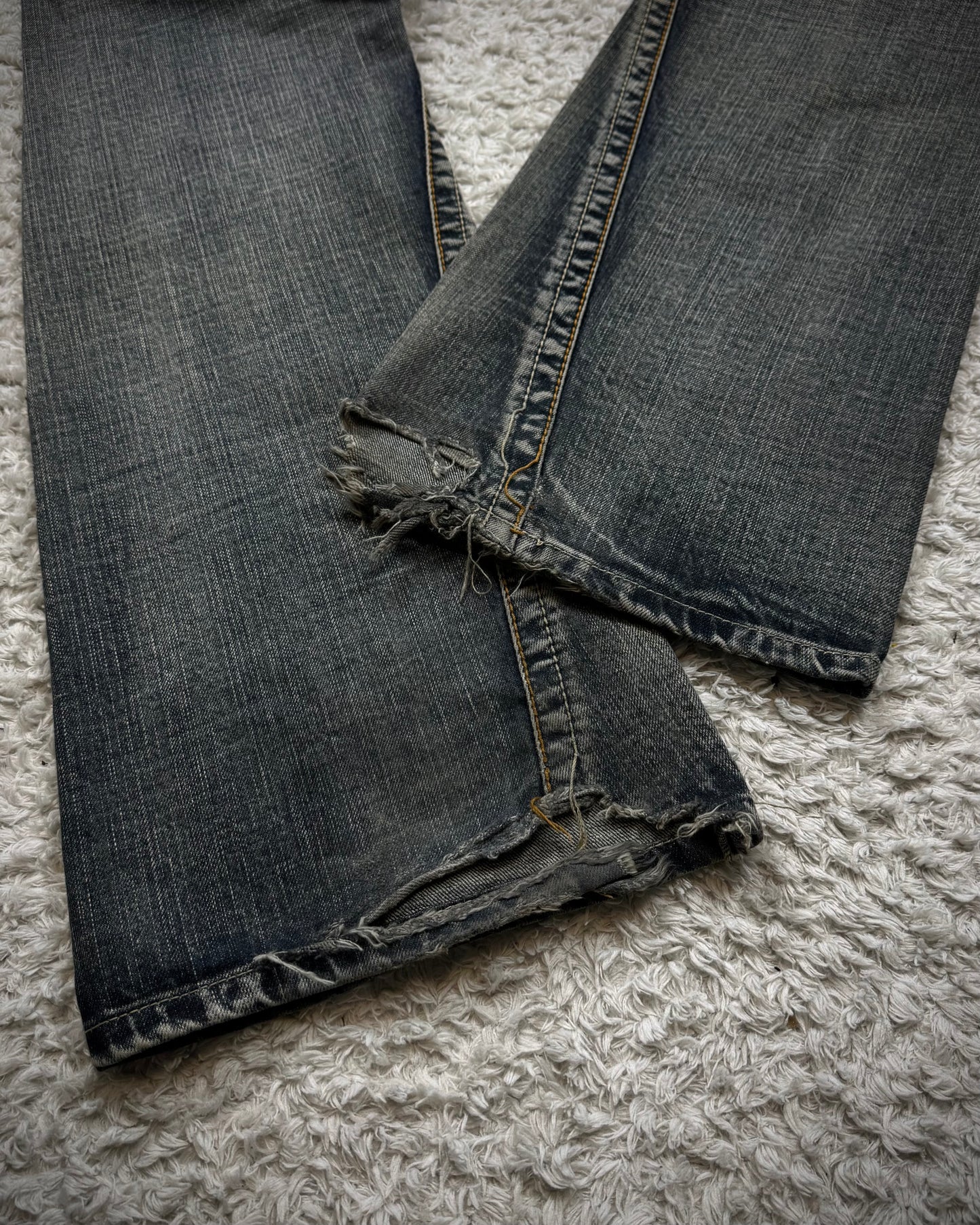 Semantic Design Python Flaps Mud Washed Spiral Flared Jeans