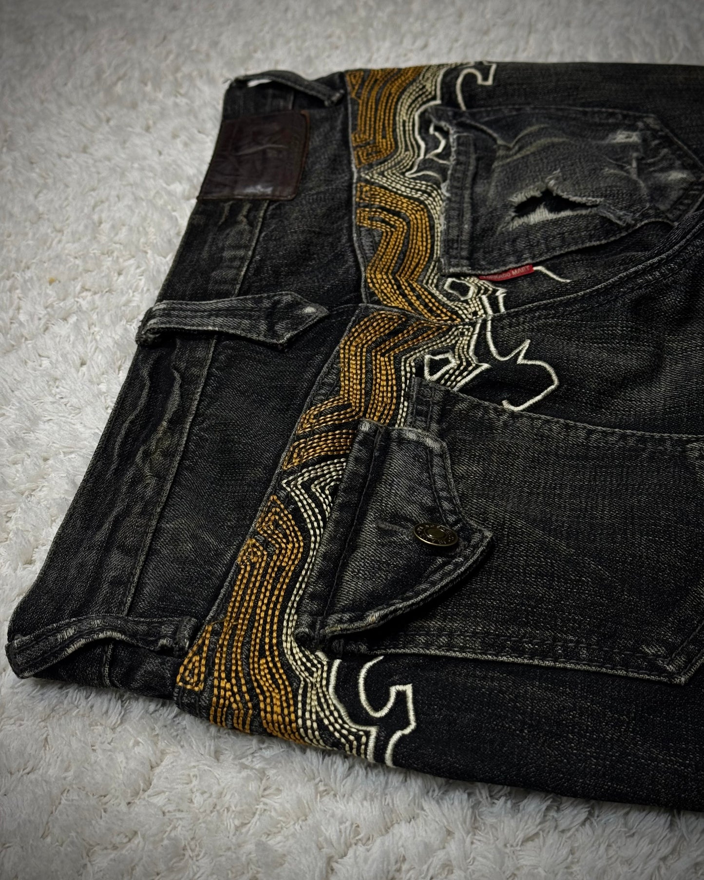 Tornado Mart Cyber Tribal Embroidery Flared Jeans