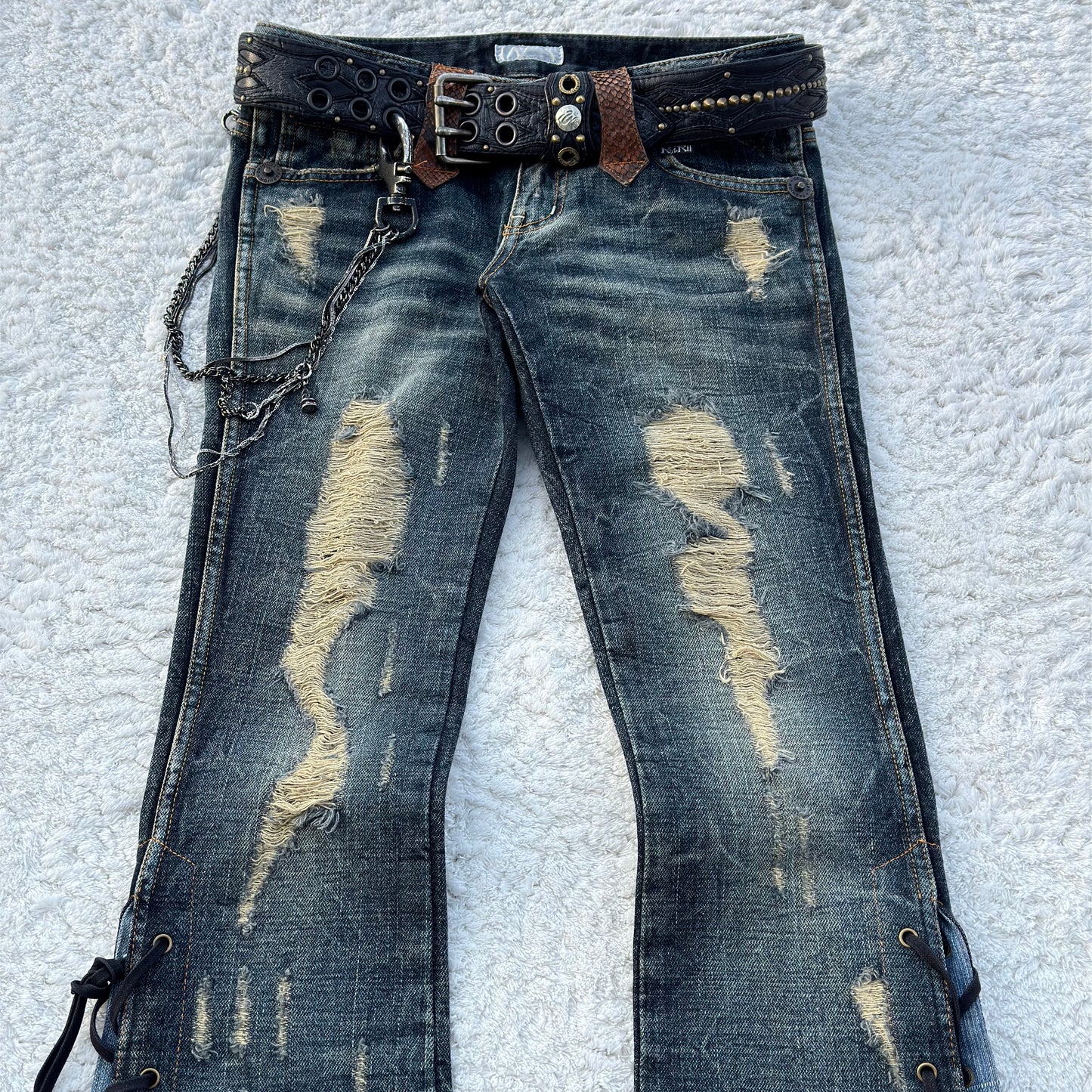 Gramercy Distressed Python Lace-Up Flared Jeans