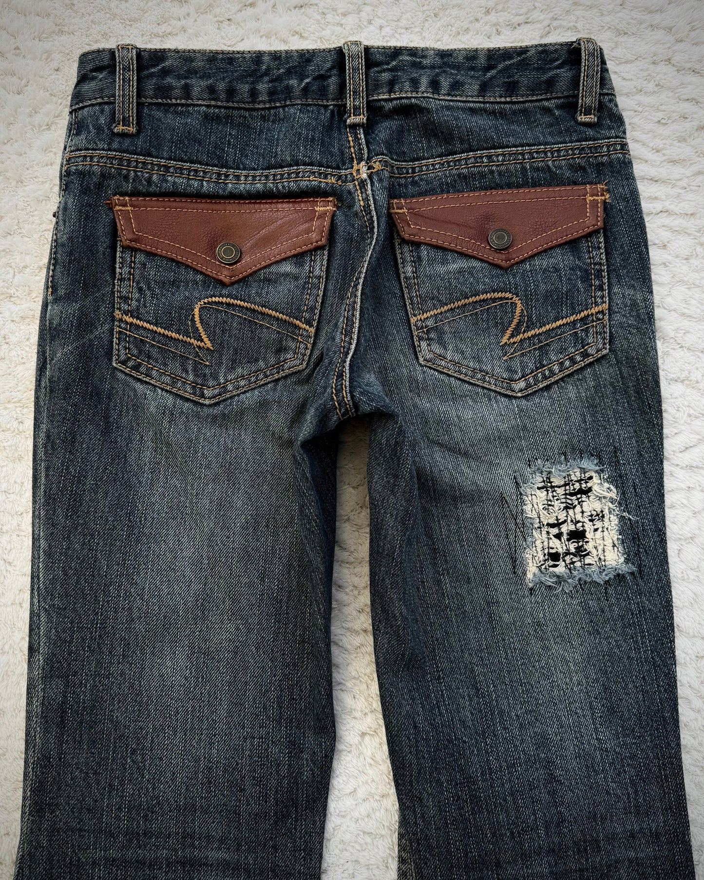 Elvence Repaired Western Spiral Flared Jeans