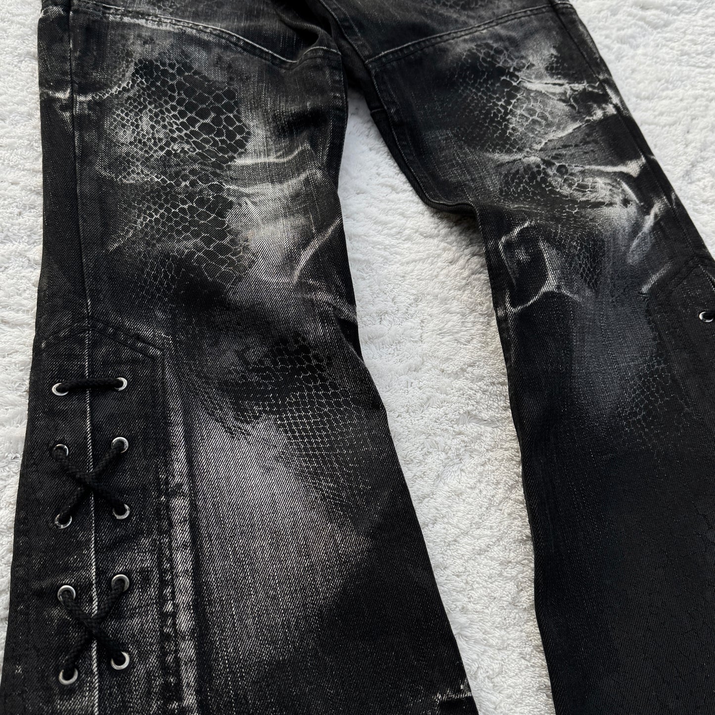 Tornado Mart Snakeskin Imprint Lace-Up Flared Jeans