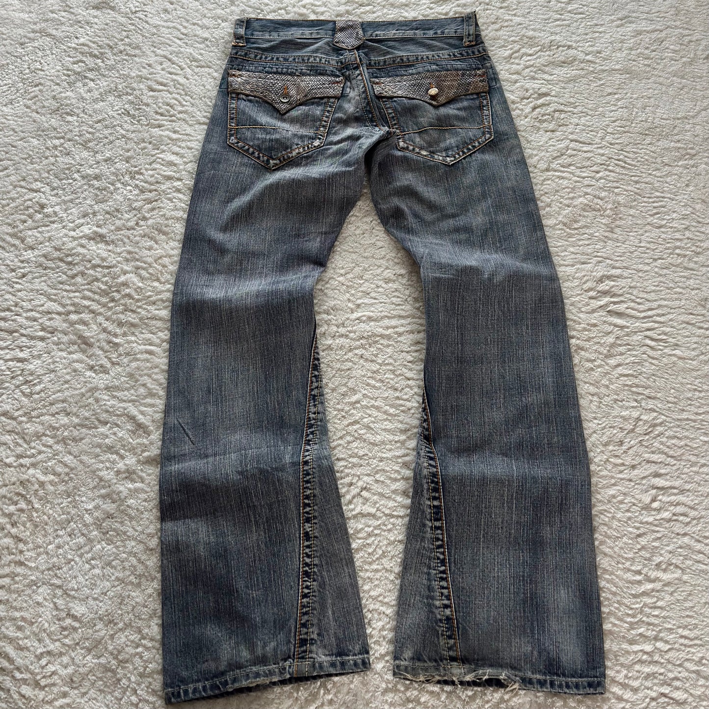 Semantic Pythom Detailed Spiral Flared Jeans