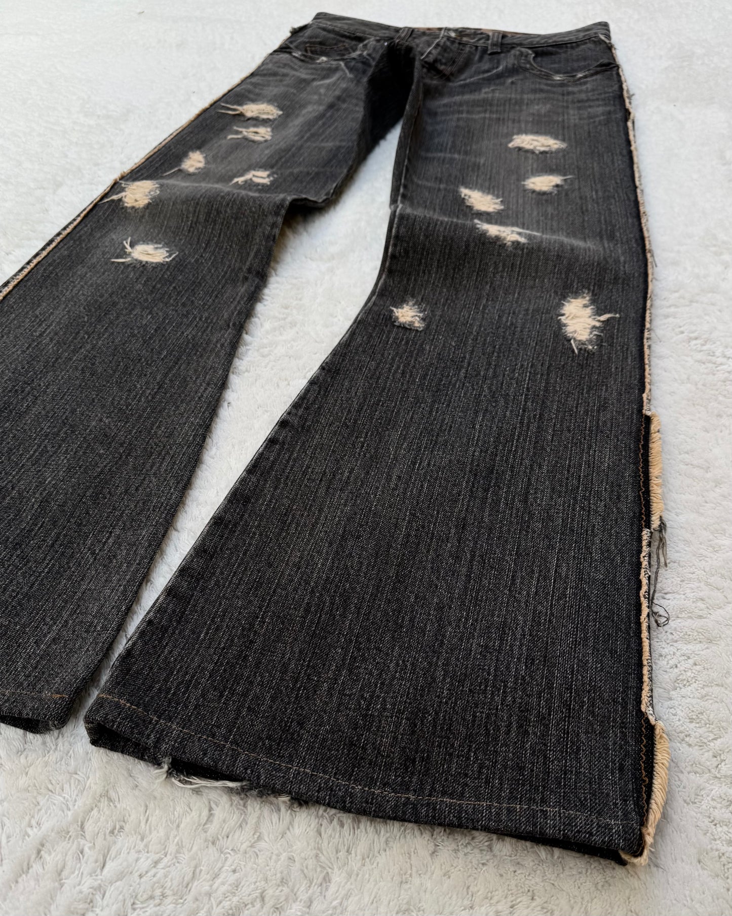 Obelisk Fringe Distressed Flared Jeans