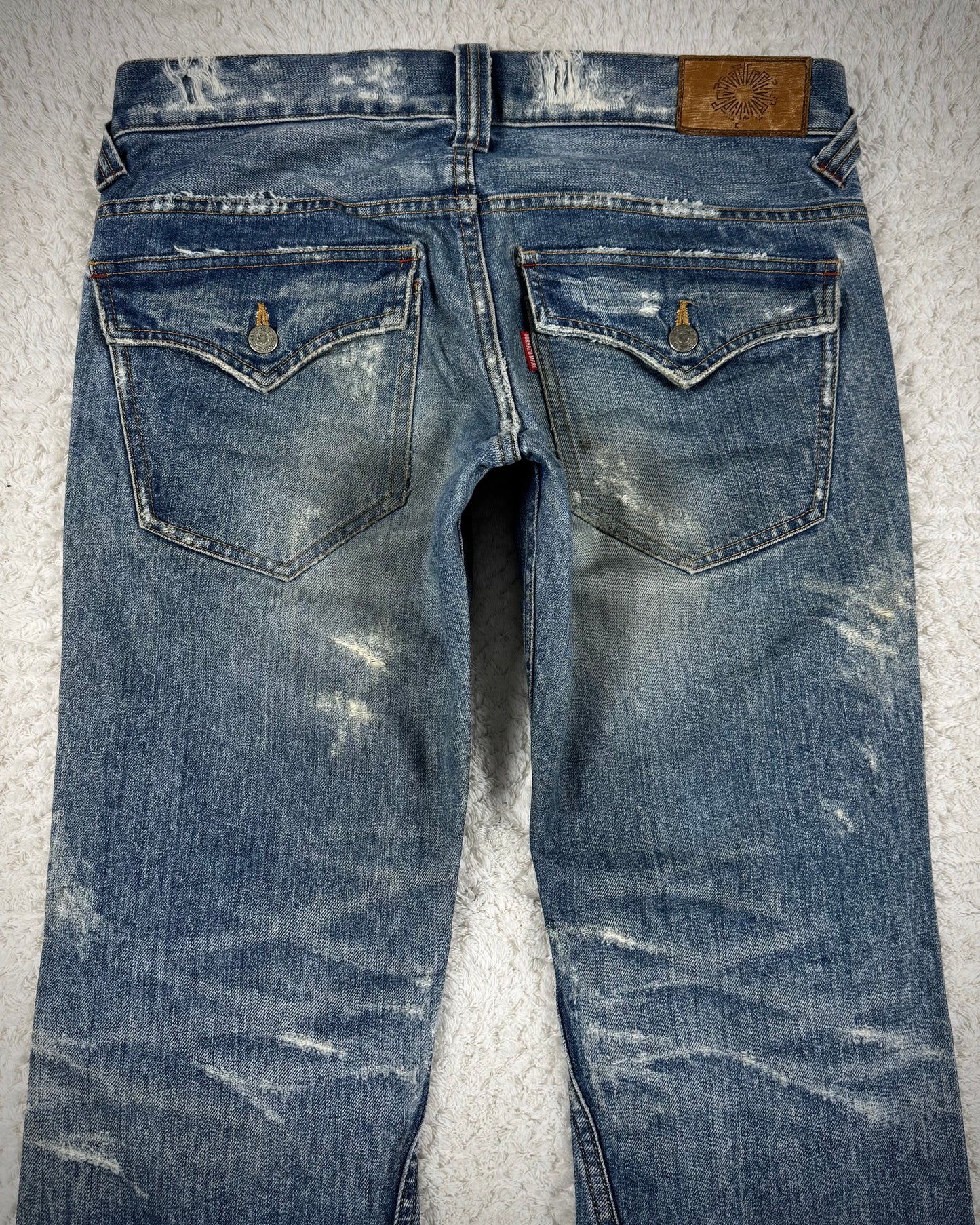 Tornado Mart Repaired Distressing Spiral Flared Jeans