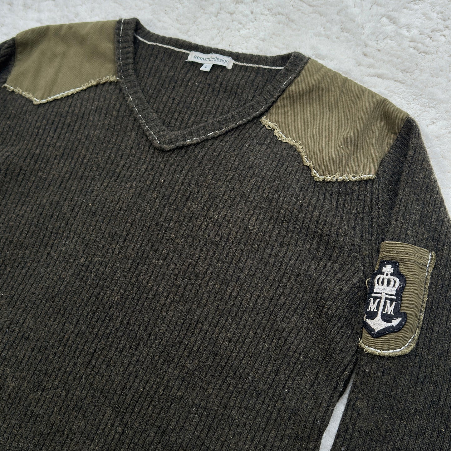 Semantic Design Shoulder Padded Ribbed Knit Sweater