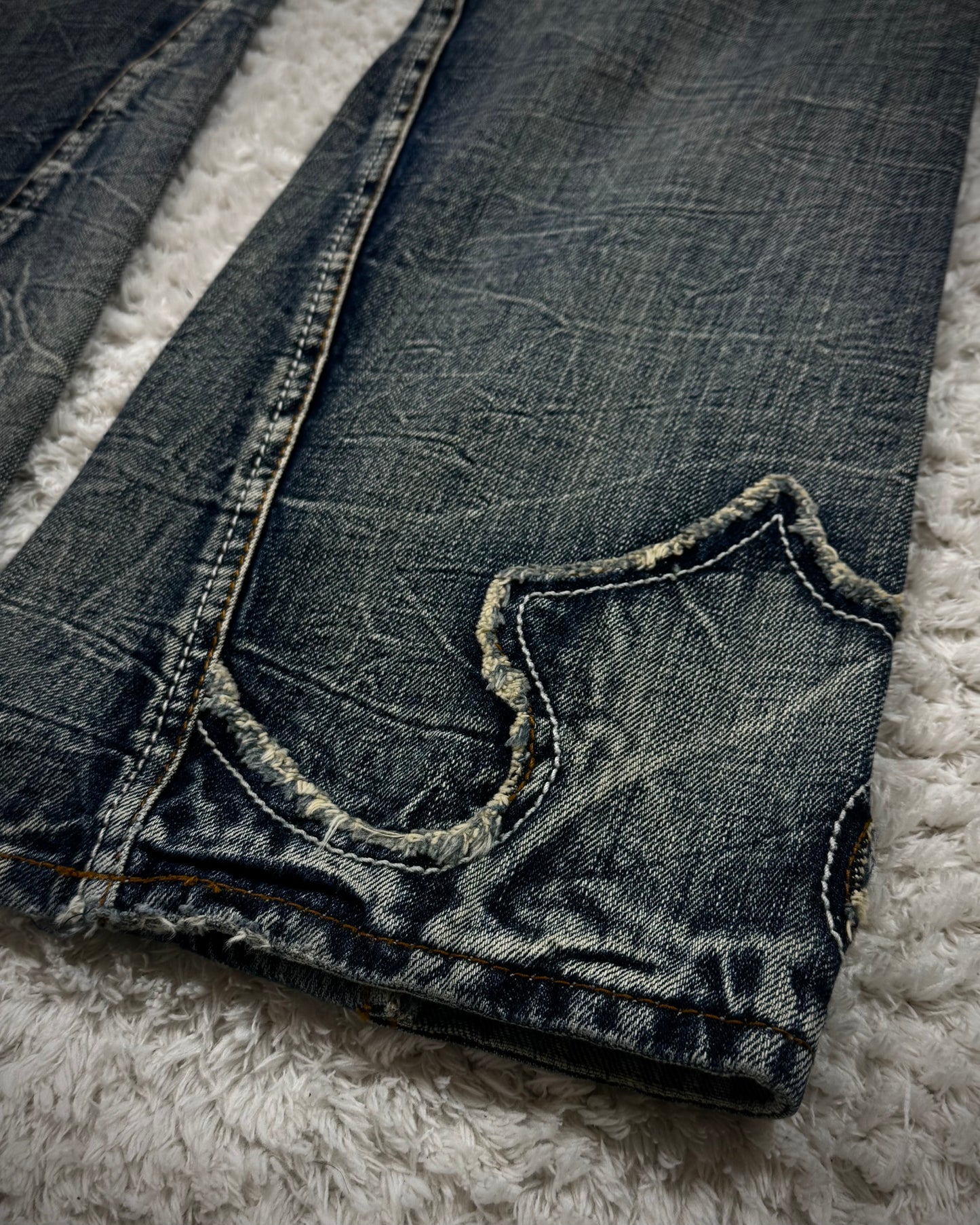 Semantic Design Studded Back Pocket Flared Jeans