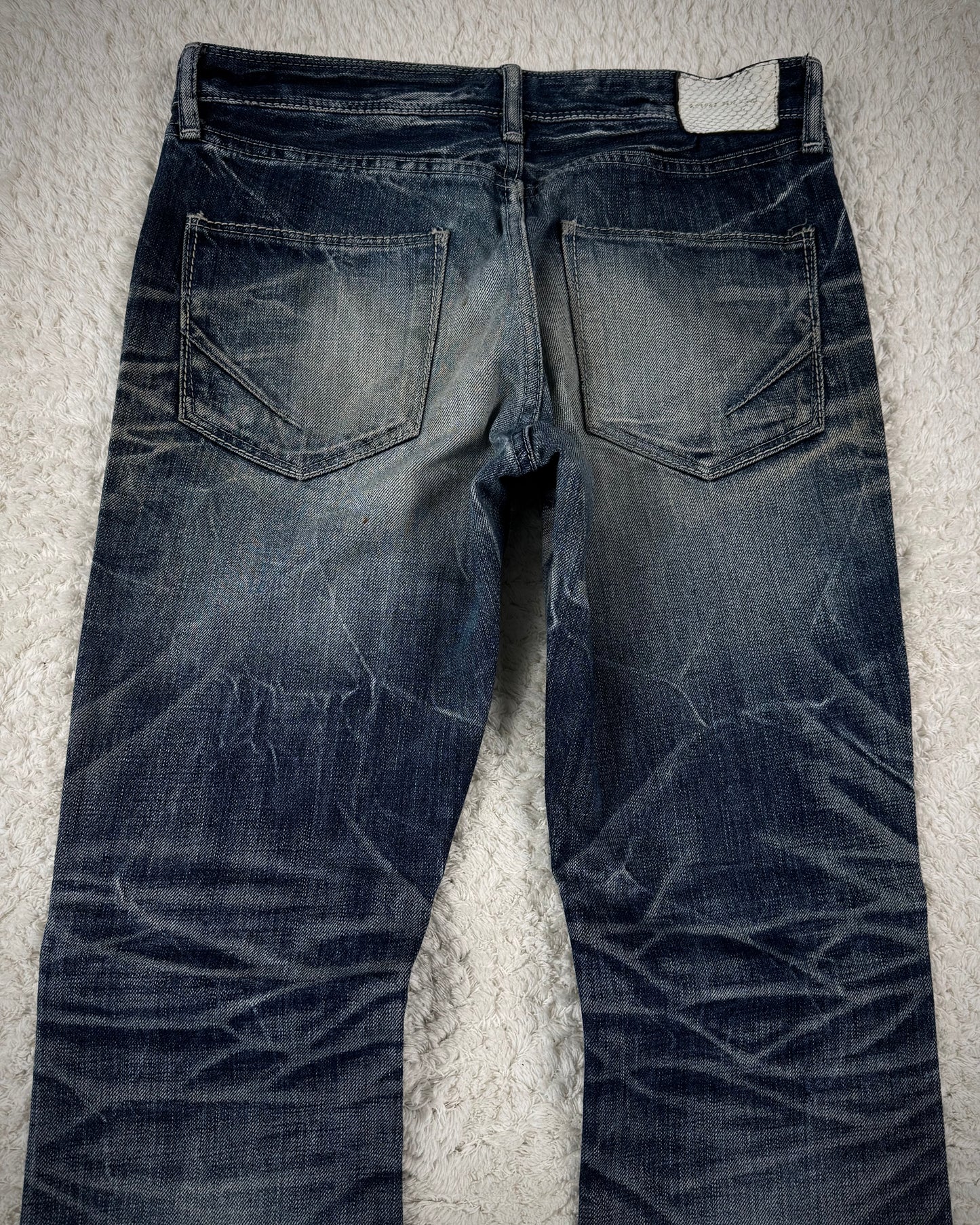 Fuga Whiskered Honeycomb Washed Snakeskin Flared Jeans