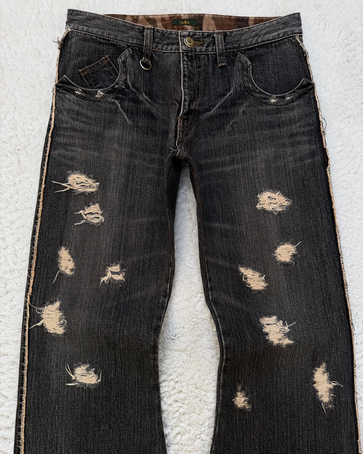 Obelisk Fringe Distressed Flared Jeans