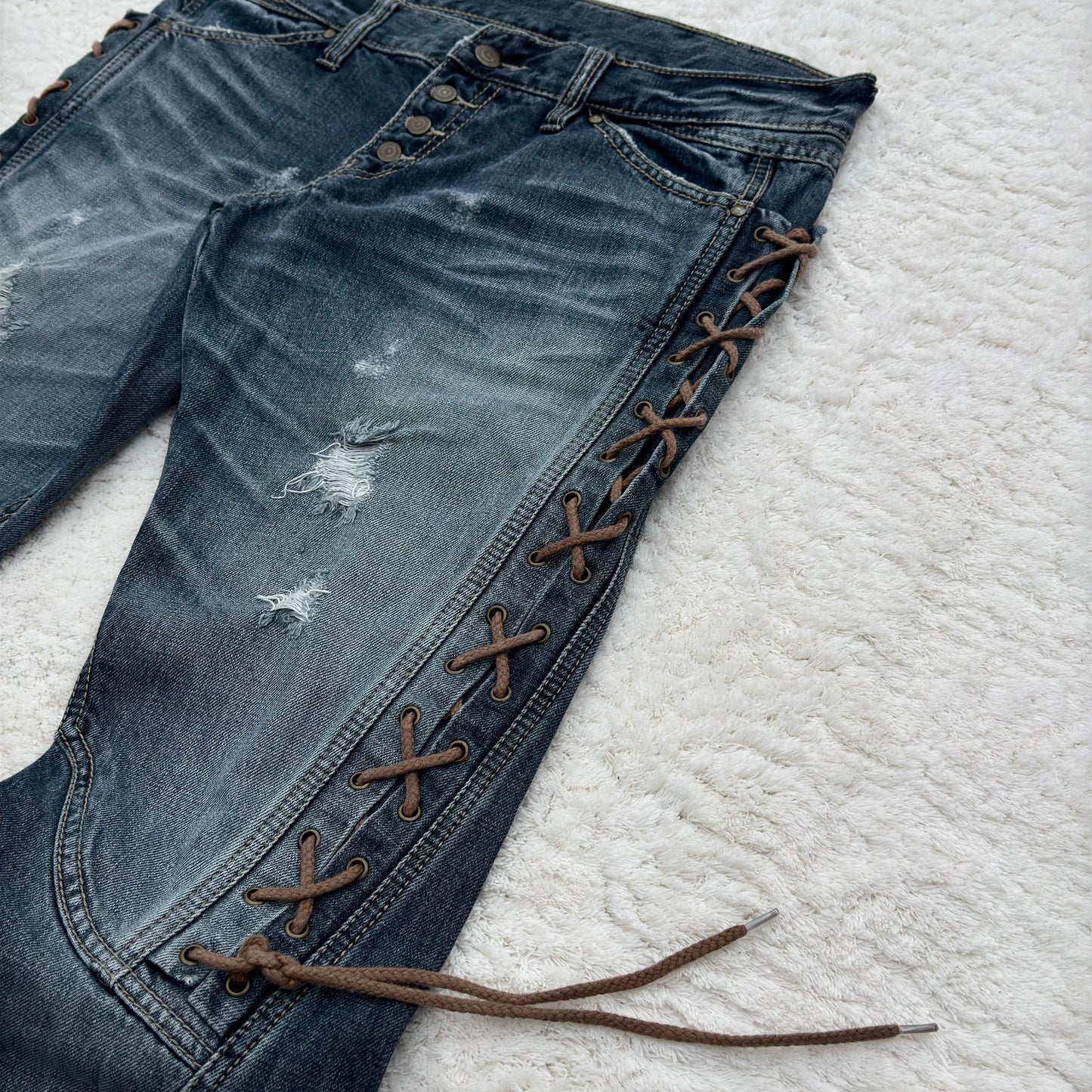 Tornado Mart Thigh Lace-Up Spiral Cut Flared Jeans