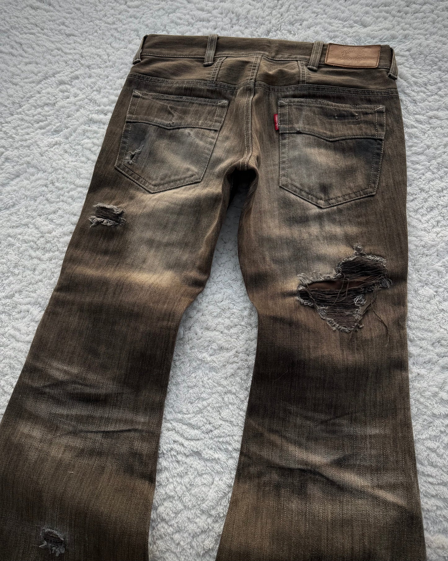 Tornado Mart Crocodile Repaired Crash Flared Jeans