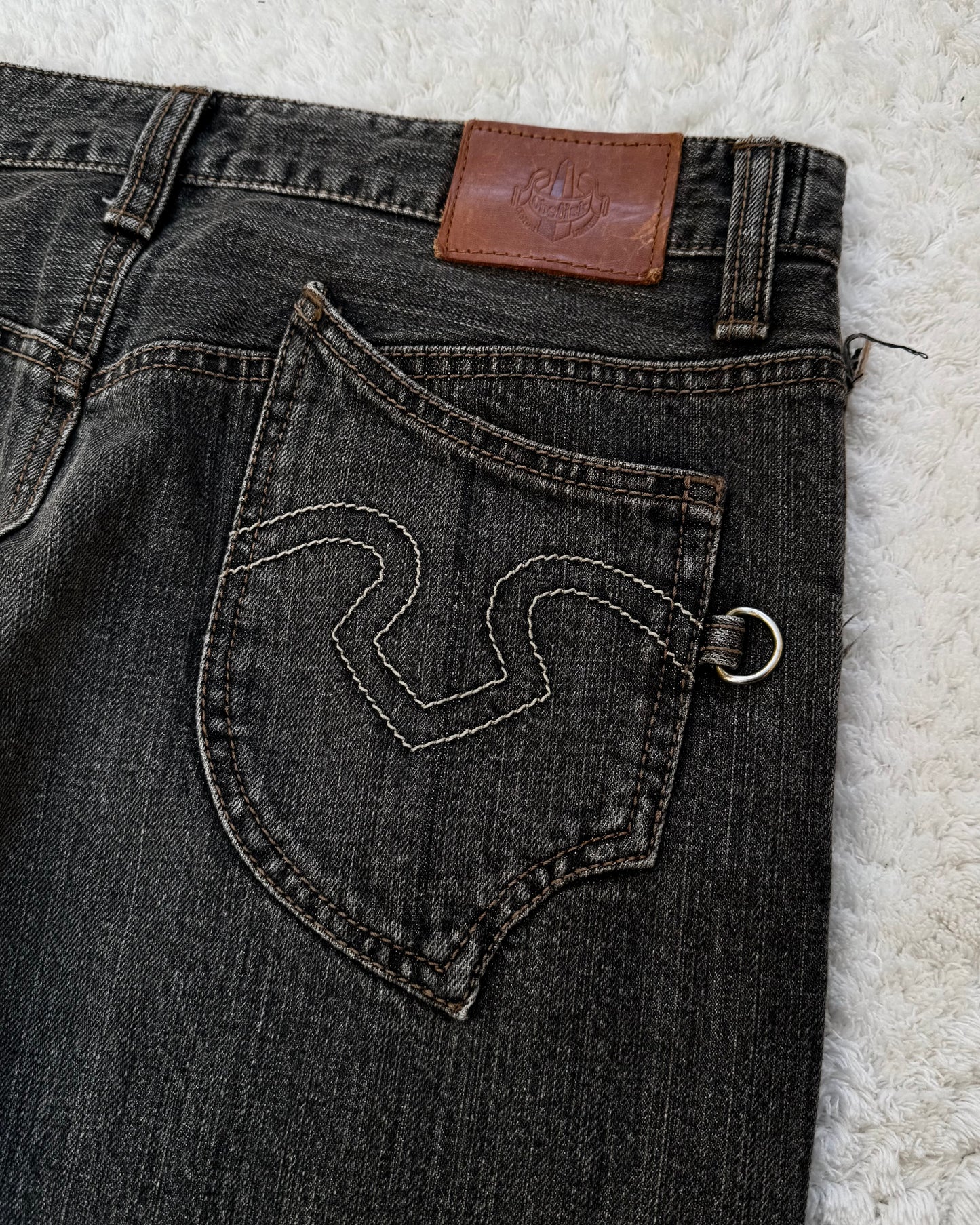 Obelisk Fringe Distressed Flared Jeans