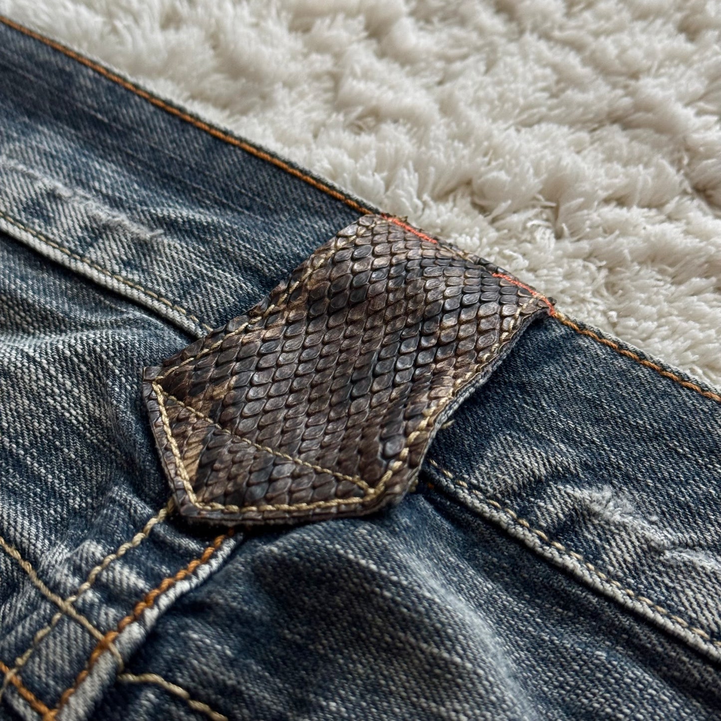 Semantic Pythom Detailed Spiral Flared Jeans