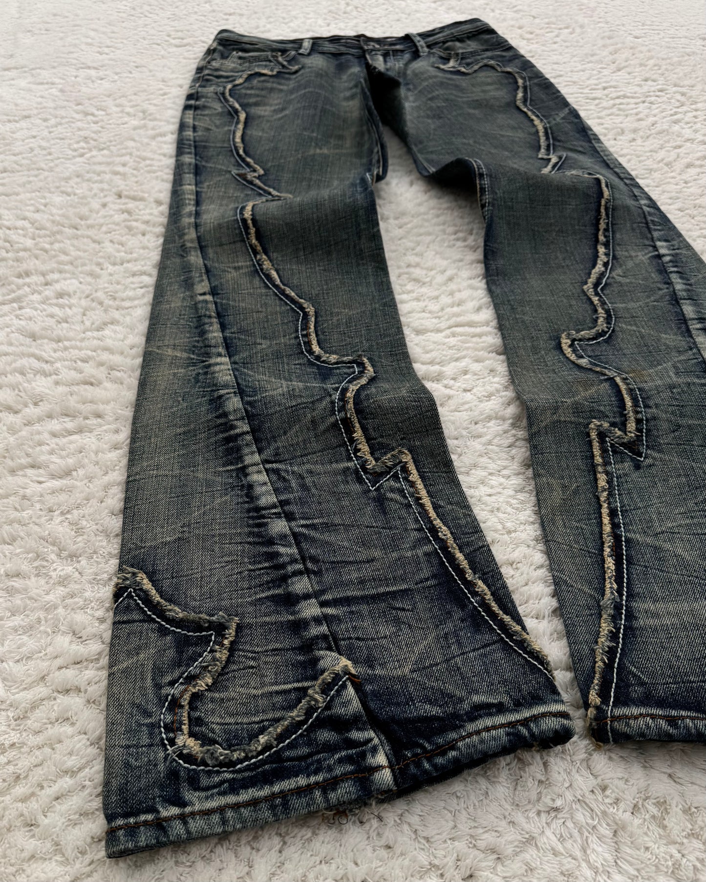 Semantic Design Mud Wash Slashed Bootcut Jeans