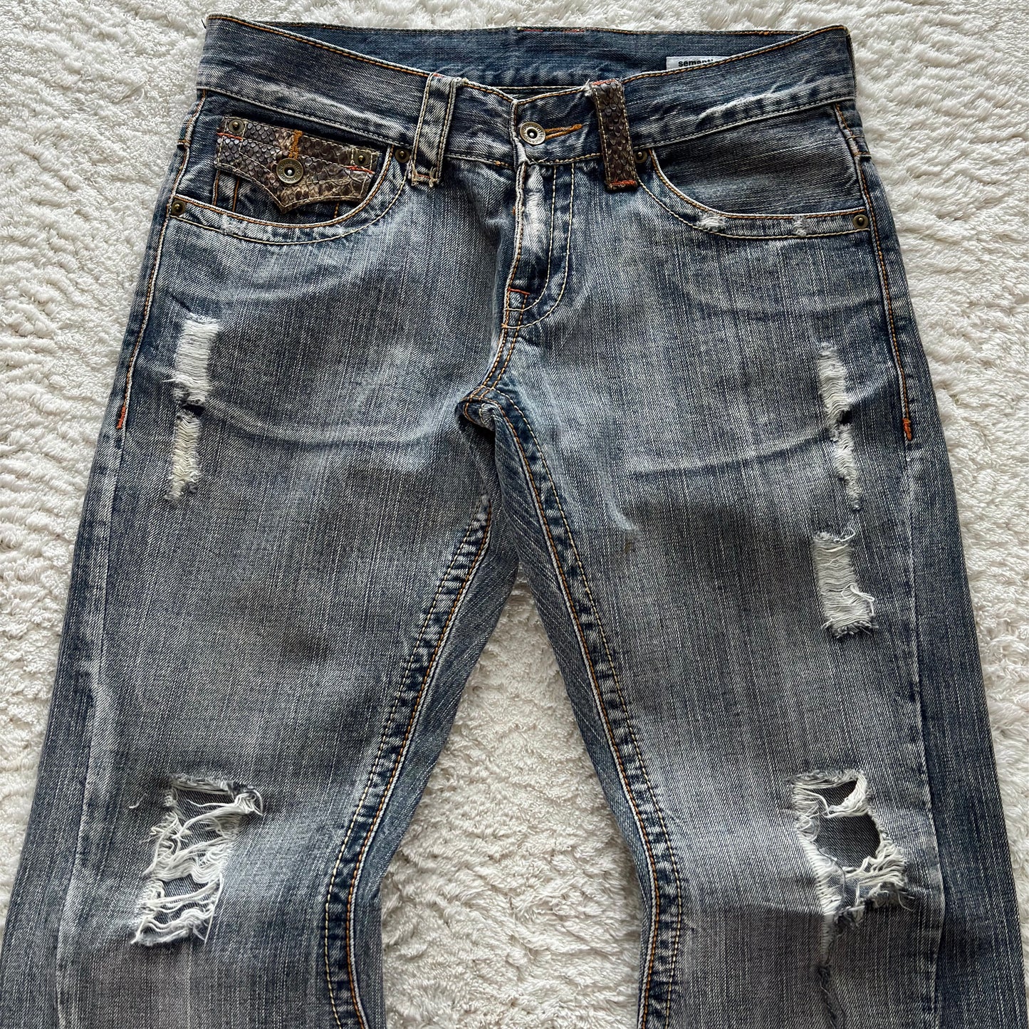 Semantic Pythom Detailed Spiral Flared Jeans