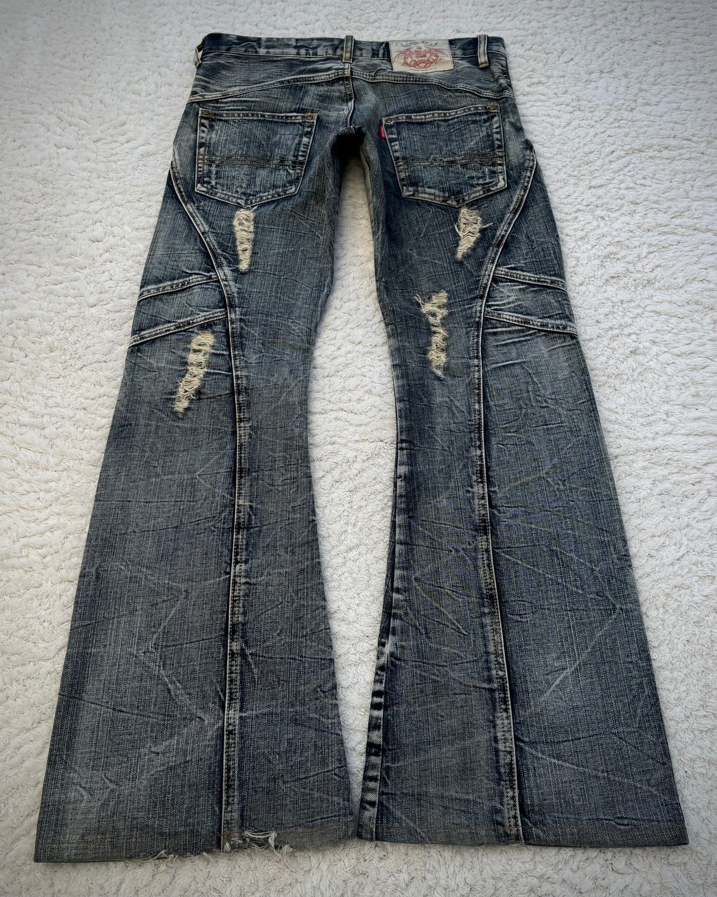 Tornado Mart Multi-Panel Crinkle Washed Flared Jeans