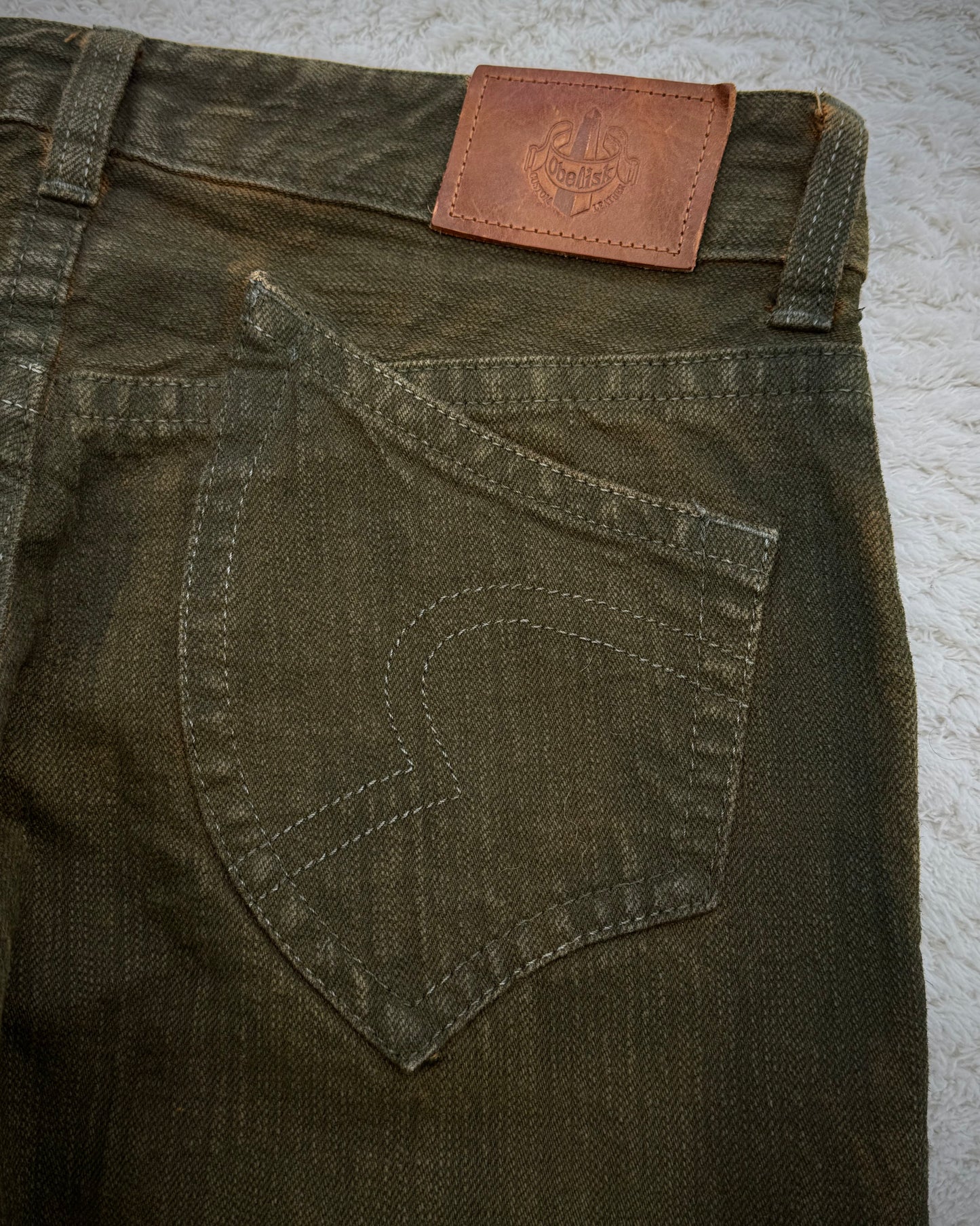Obelisk Fringed Mud Washed Lace Up Flared Jeans