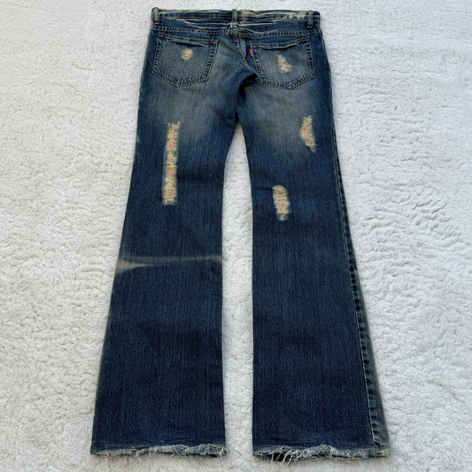 Tornado Mart Distressed Flared Jeans