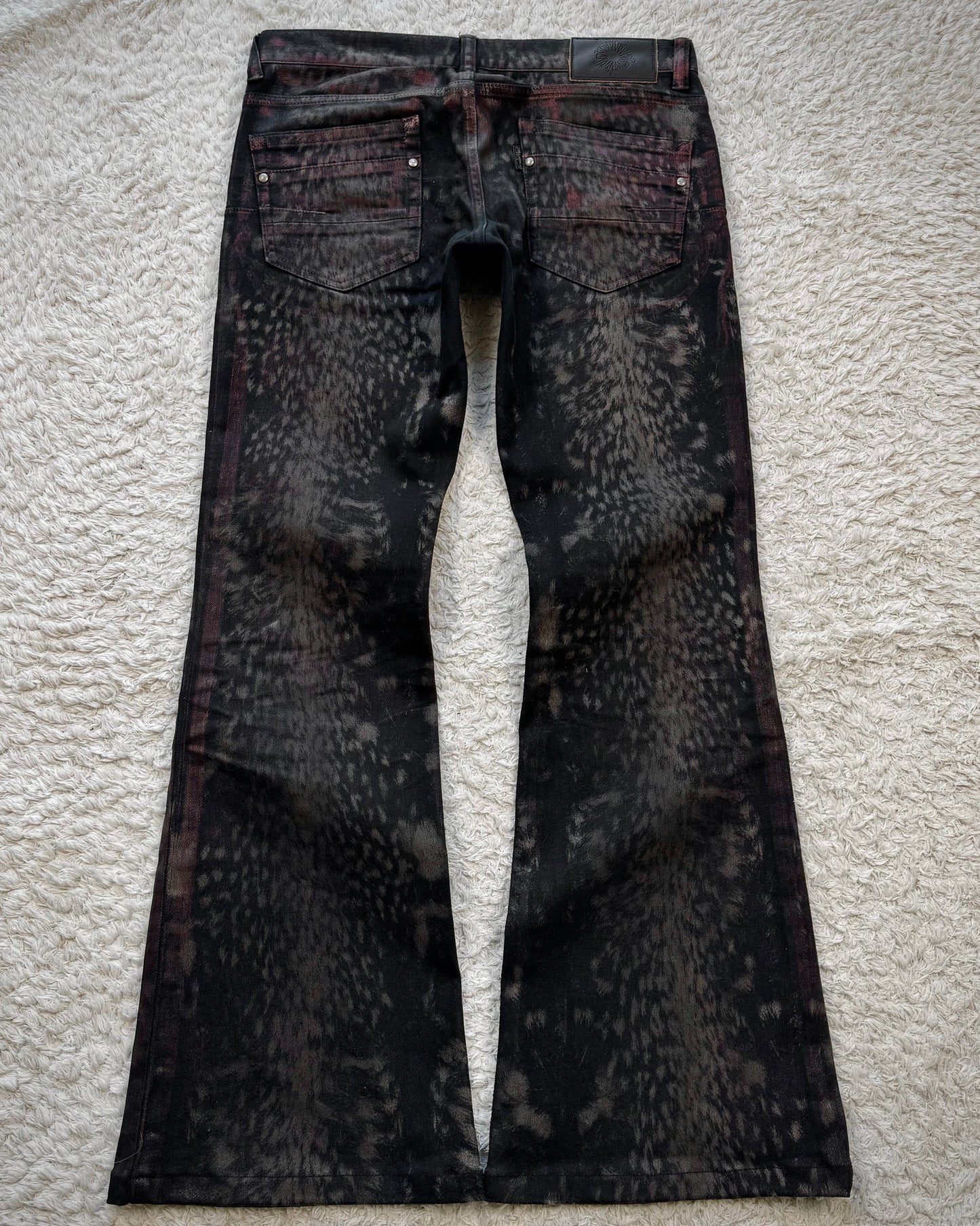 Tornado Mart Crimson Leopard Waxed Flared Jeans