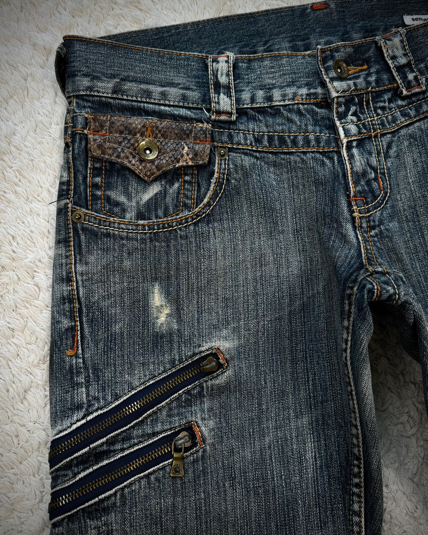 Semantic Design Python Pocket Detailed Spiral Flared Jeans
