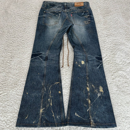 Tornado Mart Gold Splatter Flared Lace Up Jeans