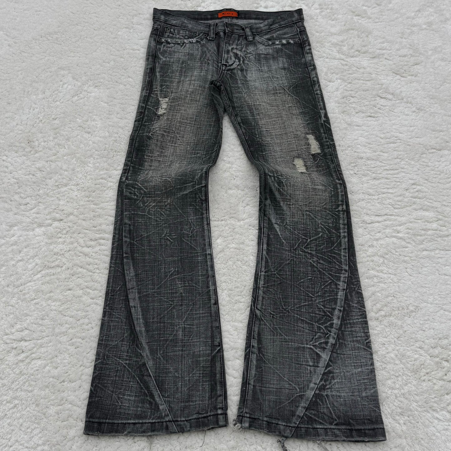 K.U.I. Cracked Wash Distressed Spiral Flared Jeans