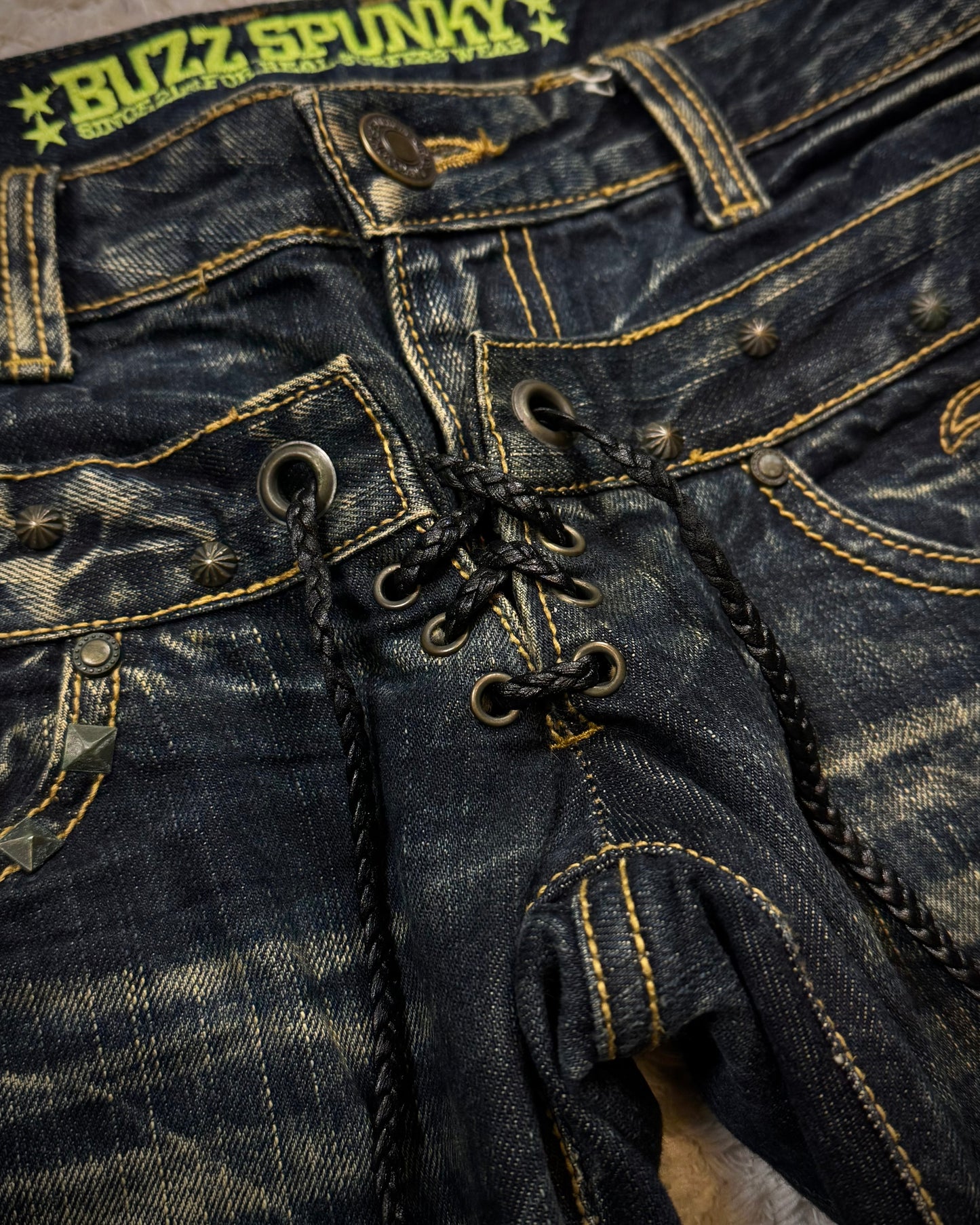 Buzz Spunky Double Waisted Lace Up Studded Flared Jeans
