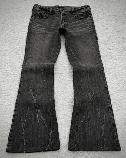 Obelisk Studded Distressed Design Flared Jeans