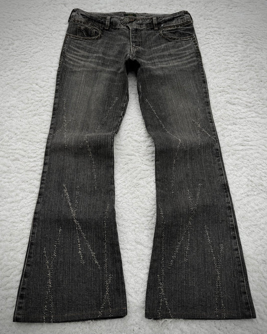 Obelisk Studded Distressed Design Flared Jeans