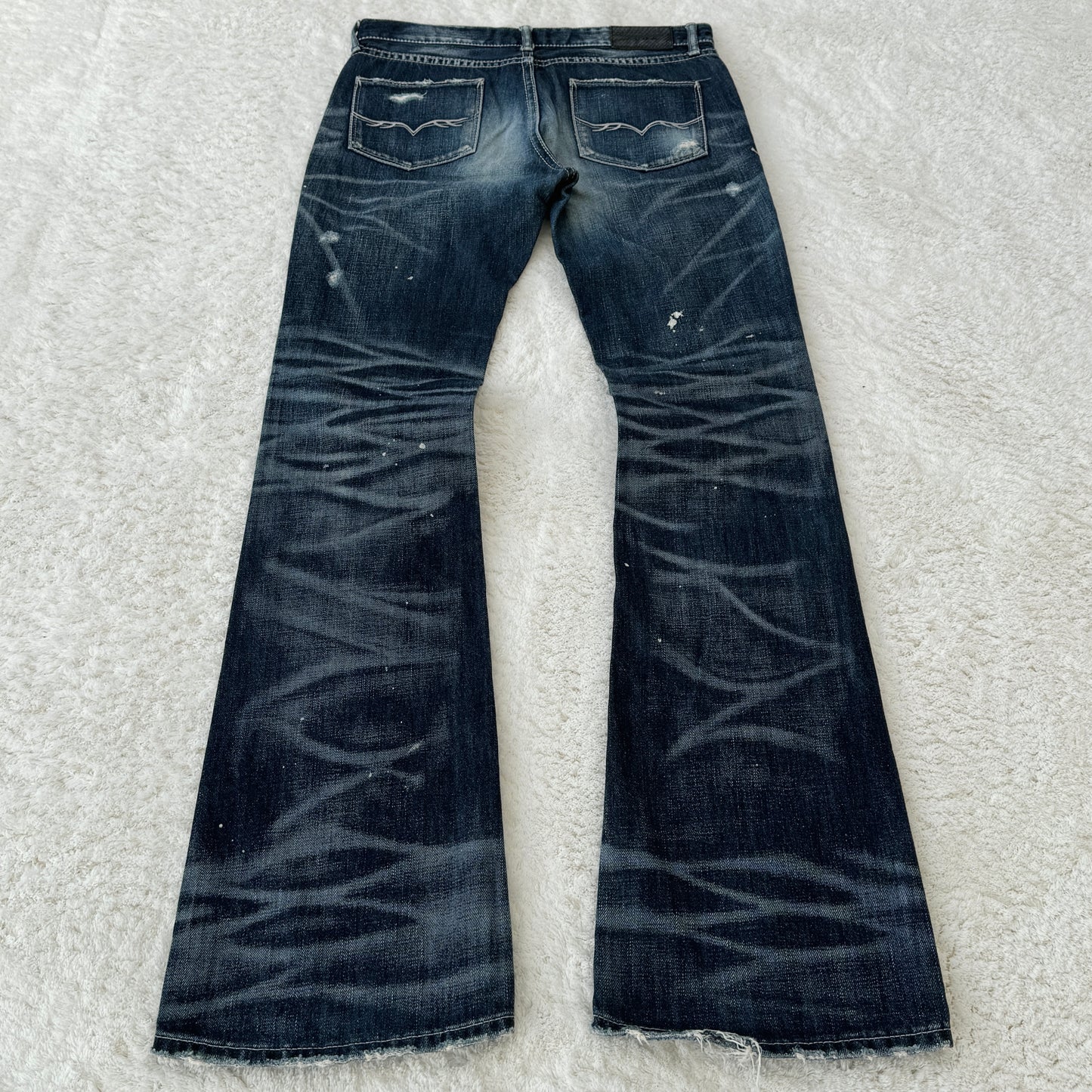 Fuga Pierced Distressed Flared Jeans